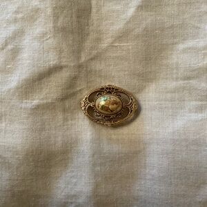 1928 Gold and Cream Brooch w/ Painted Floral design
